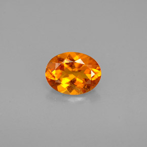 Clinohumite Naranja amarillo natural de 0.60 ct, Corte Óvalo, VS-SI