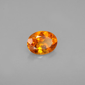 Clinohumite Naranja amarillo natural de 0.60 ct, Corte Óvalo, VS-SI