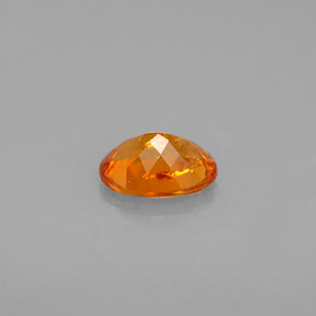 Clinohumite Naranja amarillo natural de 0.60 ct, Corte Óvalo, VS-SI
