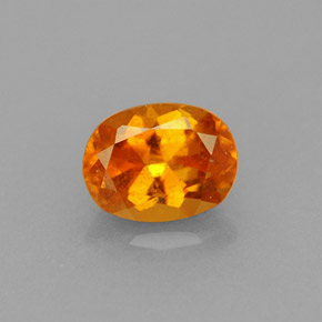 Clinohumite Naranja amarillo natural de 0.75 ct, Corte Óvalo, VS