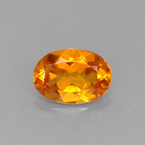 Clinohumite Naranja amarillo natural de 0.66 ct, Corte Óvalo, VS-SI