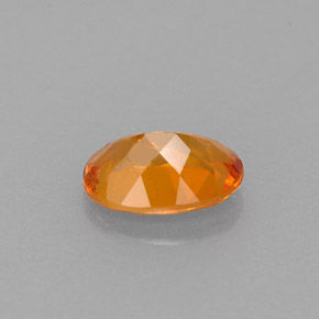 Clinohumite Naranja amarillo natural de 0.66 ct, Corte Óvalo, VS-SI