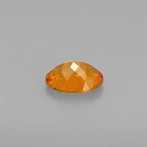 Clinohumita naranja natural de 0,57 ct, corte óvalo, VS-SI