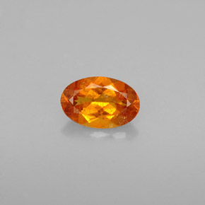 Clinohumite Naranja amarillo natural de 0.54 ct, Corte Óvalo, VS-SI