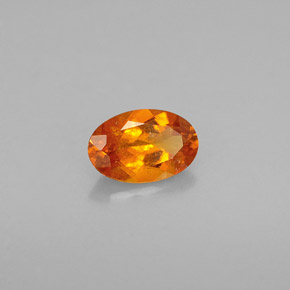 Clinohumite Naranja amarillo natural de 0.54 ct, Corte Óvalo, VS-SI