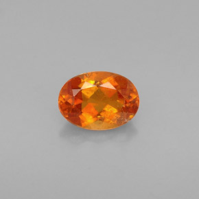Clinohumite Naranja amarillo natural de 0.64 ct, Corte Óvalo, VS-SI