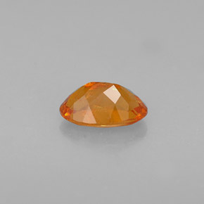 Clinohumite Naranja amarillo natural de 0.64 ct, Corte Óvalo, VS-SI