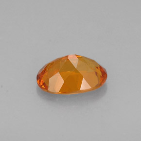 Clinohumite Naranja amarillo natural de 0.60 ct, Corte Óvalo, VS-SI