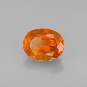 Clinohumita naranja natural de 0,72 ct, corte óvalo, VS-SI