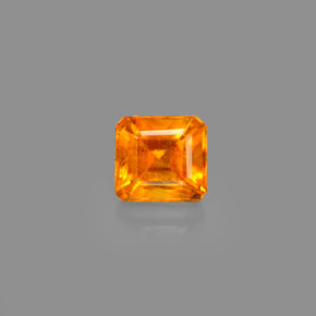 Clinohumita naranja natural de 0,69 ct, corte esmeralda, VS-SI