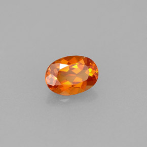 Clinohumita naranja natural de 0,55 ct, corte óvalo, VVS-VS