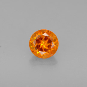 Clinohumite Naranja amarillo natural de 0.46 ct, Corte Redondo, VS