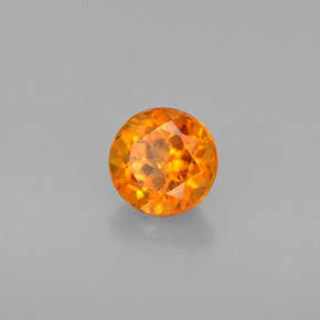 Clinohumite Naranja amarillo natural de 0.46 ct, Corte Redondo, VS