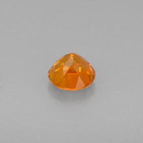 Clinohumite Naranja amarillo natural de 0.46 ct, Corte Redondo, VS