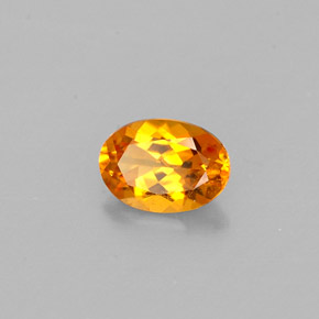 Clinohumite Naranja amarillo natural de 0.47 ct, Corte Óvalo, VS
