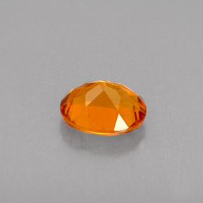 Clinohumita naranja natural de 0,48 ct, corte óvalo, VVS-VS