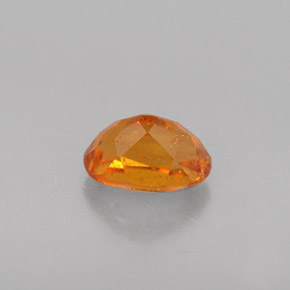 Clinohumita naranja natural de 0,52 ct, corte óvalo, VS-SI