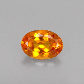 Clinohumite Naranja amarillo natural de 0.46 ct, Corte Óvalo, VS-SI