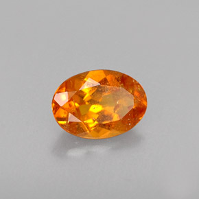 Clinohumite Naranja amarillo natural de 0.46 ct, Corte Óvalo, VS-SI