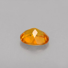 Clinohumita naranja natural de 0,41 ct, corte óvalo, VS