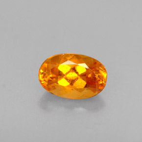 Clinohumita naranja natural de 0,47 ct, corte óvalo, VS-SI