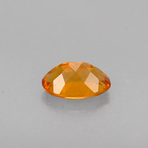 Clinohumita naranja natural de 0,47 ct, corte óvalo, VS-SI