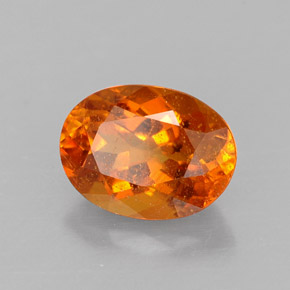 Clinohumite Naranja amarillo natural de 1.43 ct, Corte Óvalo, SI