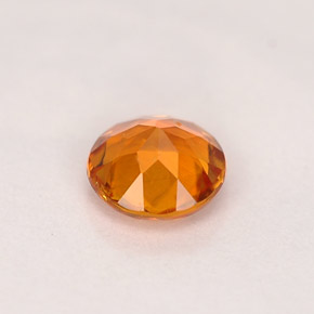 Clinohumita naranja amarillento natural de 0,68 ct, corte redondo, VS-SI