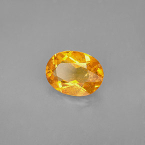 Clinohumita naranja natural de 1,68 ct, corte óvalo, VS-SI
