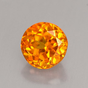 Clinohumite Naranja amarillo natural de 0.89 ct, Corte Redondo, VS-SI