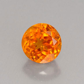 Clinohumite Naranja amarillo natural de 0.80 ct, Corte Redondo, VS-SI
