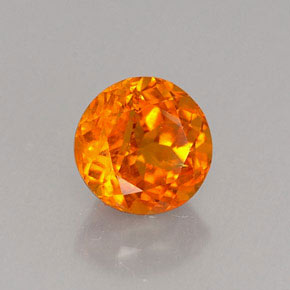 Clinohumite Naranja amarillo natural de 0.80 ct, Corte Redondo, VS-SI