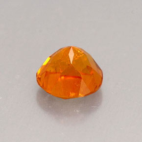 Clinohumite Naranja amarillo natural de 0.80 ct, Corte Redondo, VS-SI