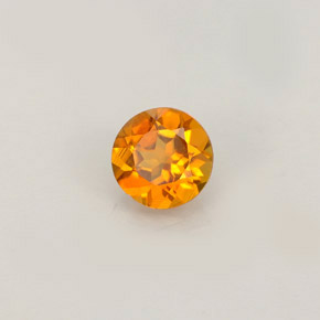 Clinohumita naranja amarillento natural de 0,52 ct, corte redondo, VS