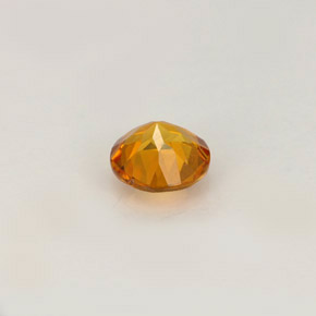 Clinohumita naranja amarillento natural de 0,52 ct, corte redondo, VS
