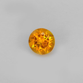 Clinohumite Naranja amarillo natural de 0.60 ct, Corte Redondo, VS-SI