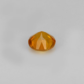 Clinohumite Naranja amarillo natural de 0.60 ct, Corte Redondo, VS-SI
