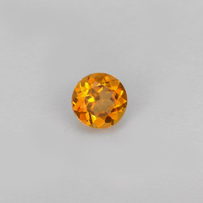 Clinohumite Naranja amarillo natural de 0.39 ct, Corte Redondo, VS-SI