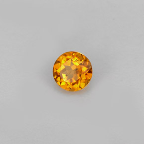 Clinohumite Naranja amarillo natural de 0.39 ct, Corte Redondo, VS-SI