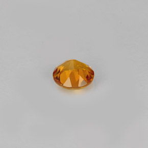 Clinohumite Naranja amarillo natural de 0.39 ct, Corte Redondo, VS-SI