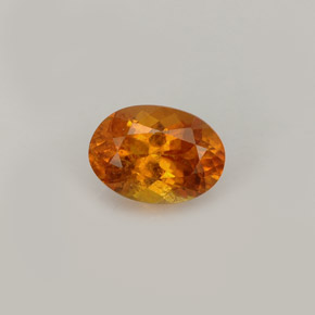 Clinohumita naranja natural de 0,93 ct, corte óvalo, VS-SI