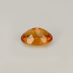 Clinohumita naranja natural de 0,93 ct, corte óvalo, VS-SI