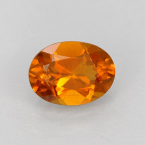 Clinohumite Naranja amarillo natural de 0.84 ct, Corte Óvalo, VS-SI