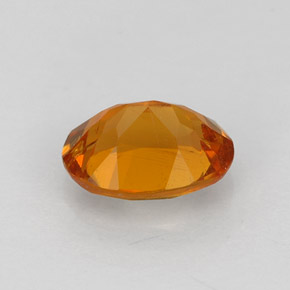 Clinohumite Naranja amarillo natural de 0.84 ct, Corte Óvalo, VS-SI