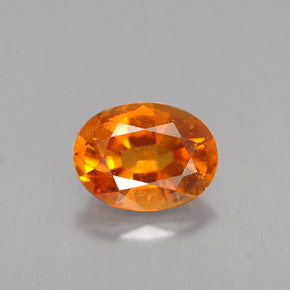 Clinohumite Naranja amarillo natural de 1.47 ct, Corte Óvalo, VS-SI