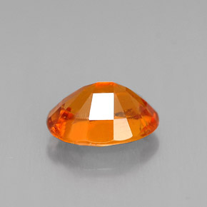 Clinohumite Naranja amarillo natural de 1.47 ct, Corte Óvalo, VS-SI