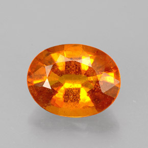 Clinohumite Naranja amarillo natural de 1.46 ct, Corte Óvalo, VS-SI
