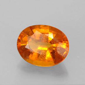 Clinohumite Naranja amarillo natural de 1.46 ct, Corte Óvalo, VS-SI