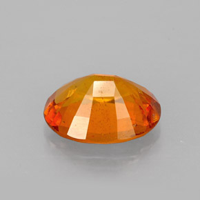 Clinohumite Naranja amarillo natural de 1.46 ct, Corte Óvalo, VS-SI