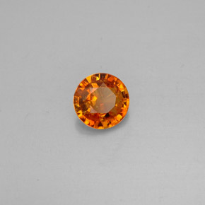 Clinohumite Naranja amarillo natural de 0.63 ct, Corte Redondo, VS-SI